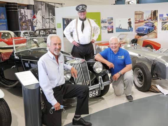 Warwick Kia managing director David Derbyshire, British Motor Museum explainer Jim Ellison and Leamington Rotary Club fundraising committee chairman Barry Andrews.