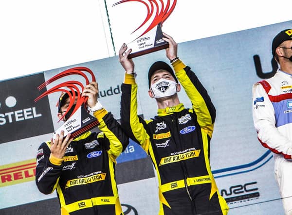 Podium celebrations for the runners-up Phil Hall and Jon Armstrong
