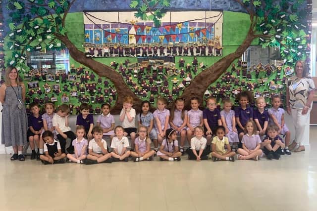 Mrs Bridges (Art Leader) with Reception class and Mrs Willis (Head of School) in front of the new 3D display. Photo supplied
