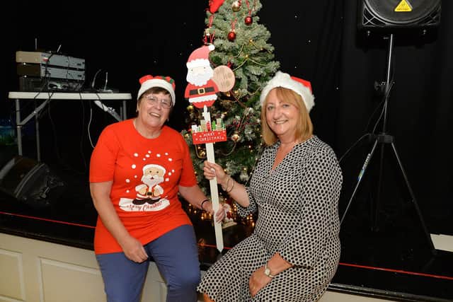Helen Potter volunteer and trustee with Alison Anderton general manager of Age Concern Lutterworth during their Christmas Party in July.
PICTURE: ANDREW CARPENTER