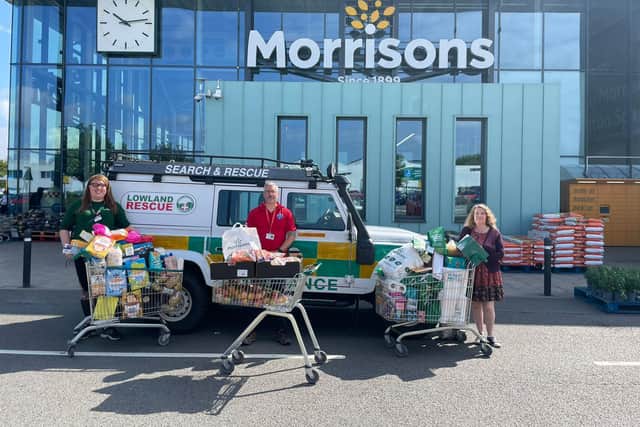 Warwickshire Search and Rescue Search Operations Lead, Phil Hewish (centre), teamed up with Morrisons community champion, Alex Pearson (left), and Helen Smith from Evelyn’s Gift (right) to spread more acts of kindness. Photo supplied