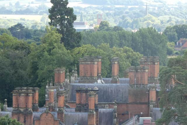 Welcombe House chimnies, with the RSC theatre and spire of Holy Trinity Church in the background.