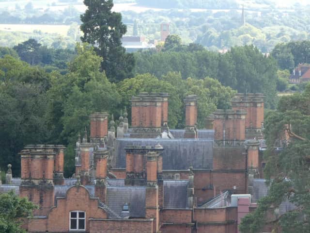 Welcombe House chimnies, with the RSC theatre and spire of Holy Trinity Church in the background.