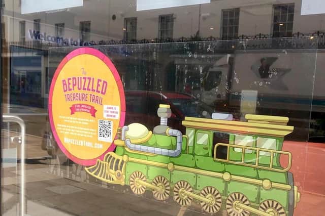 Examples of the vehicles in shop windows for families to find along the trail. Photo supplied