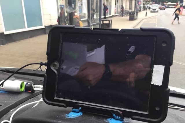 A van driver was stopped today (Monday) after he was spotted watching a film at the wheel. Photo by OPU Warwickshire