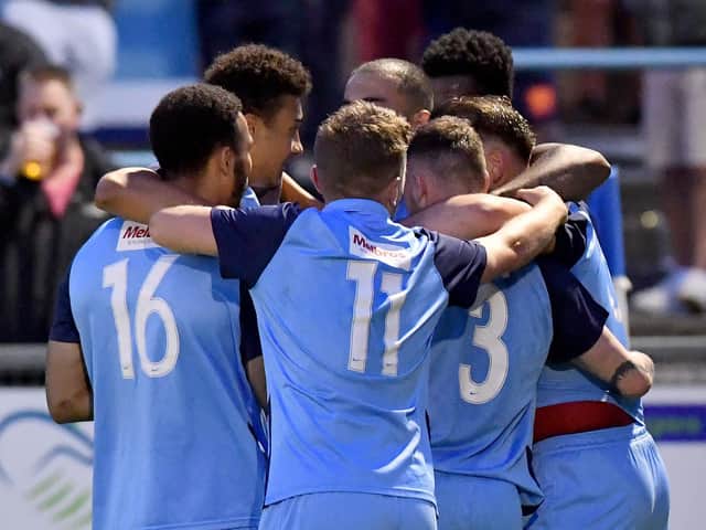 Rugby celebrate their first goal of the season