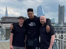 Cleary’s boxer Matty Harris with manager Max McCracken and trainer Edwin Cleary on top  of Wasserman HQ in London