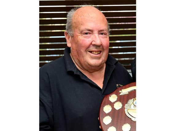 Tony Mann presenting a shield at the club’s last awards evening in 2019