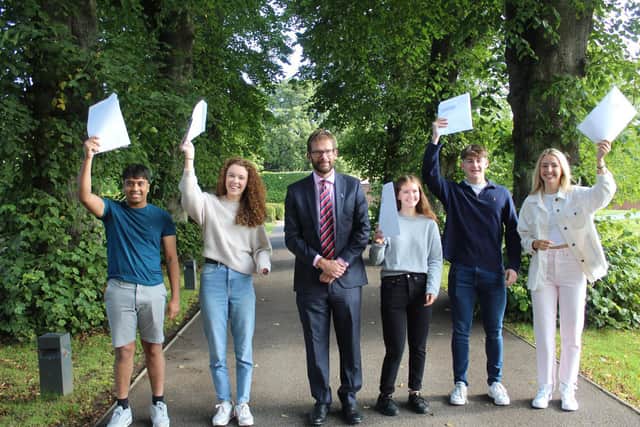 Princethorpe College A-level results: (left to right) Prajeet Prabakaran, Charlotte Lister, Ed Hester (Headmaster), Carmel Spelman, James Gallagher and Grace McGrory.