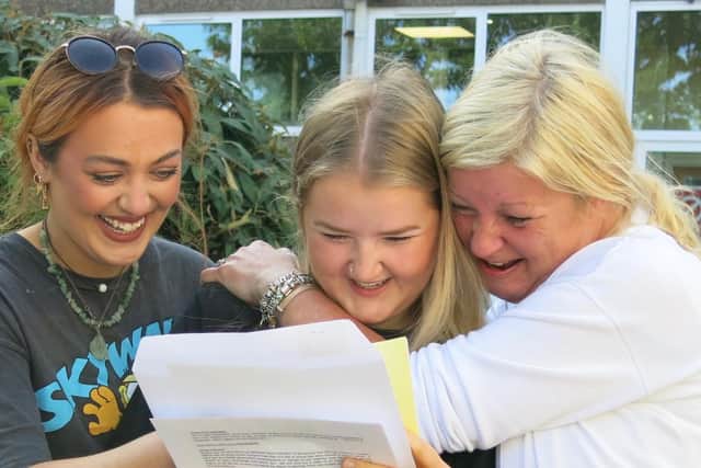 Southam College pupil Georgie celebrates her GCSE results.