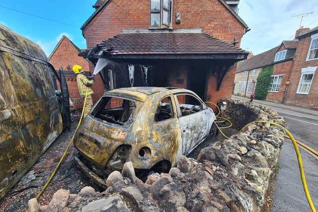 A property and nearby vehicles were affected by the fire. Photo by Southam Fire Station