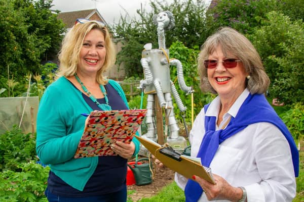 Maggie Field, Kenilworth Town Clerk and Lily Brownjohn, secretary for the Kenilworth Allotment Tenant’s Association, judge the scarecrows before the Odibourne Allotment site Open Day event on Sunday (August 22).