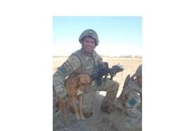 Private Conrad and his dog Pegasus (Peg) in Afghanistan.