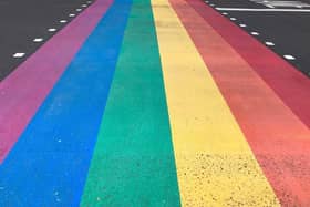 Work on a rainbow crossing on Leamington's Parade has been delayed - but workers say they are still committed to completing the work.