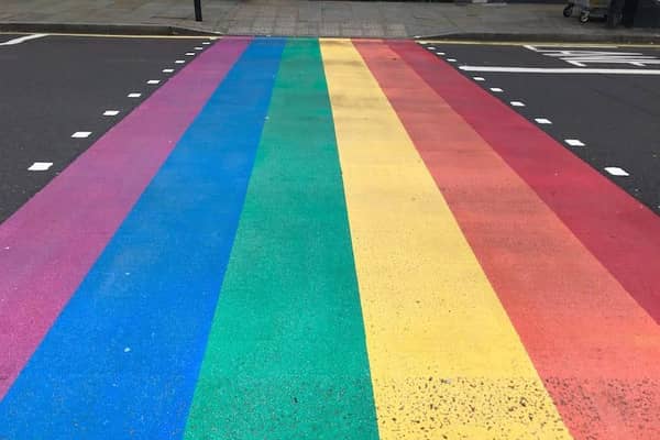 Work on a rainbow crossing on Leamington's Parade has been delayed - but workers say they are still committed to completing the work.