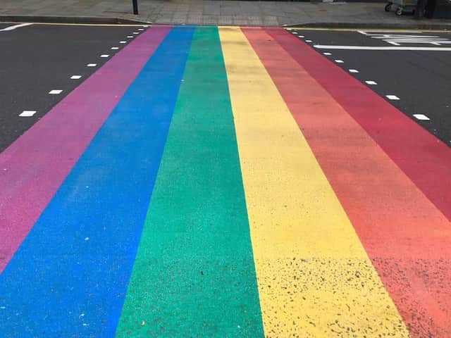 Work on a rainbow crossing on Leamington's Parade has been delayed - but workers say they are still committed to completing the work.