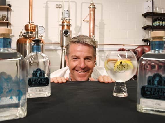 David Blick, founder of Warwickshire Gin Company, showcases the new Peeping Tom gin at their distillery in Leamington