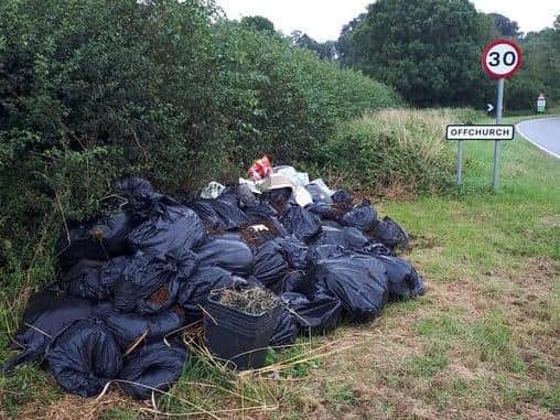 A huge pile of rubbish - including cuttings from a cannabis farm - has been dumped on the edge of Offchurch. Photo by PCSO Sharron Underwood.