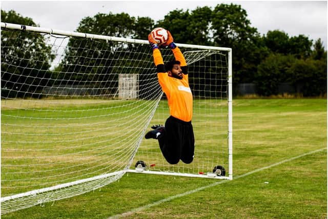 Southam Sporting FC goalkeeper making a save. Photo supplied