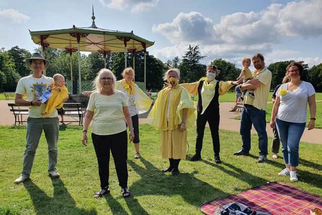 People dressed in yellow, calling themselves the Canary Craftivists, met in the Pump Room Gardens on Sunday (August 22) to discuss climate change.