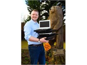 Phil MacRae has been helping school children and people in need by collecting and refurbishing old technology and is now looking to help refugees fleeing Afghanistan. Photo supplied