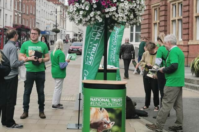 Volunteers and staff from the national animal welfare charity the League Against Cruel Sports, including one in a fox costume, gathered outside Leamington Town Hall today to urge the public to take action and sign up to its National Trust campaign.