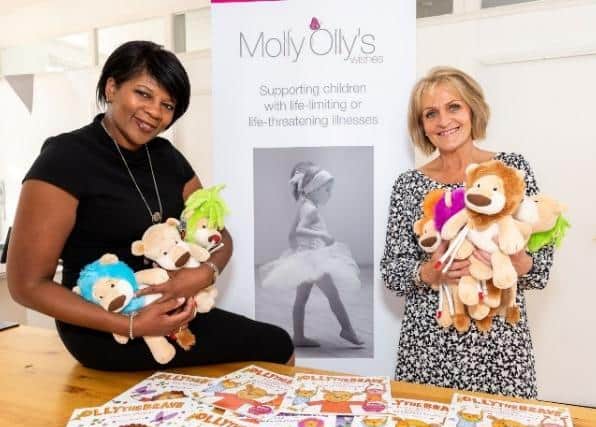 Jackie Evans from Molly Olly's and Angela Nurse from Bellway South Midlands at Molly Olly’s Wishes’ offices in Warwick.