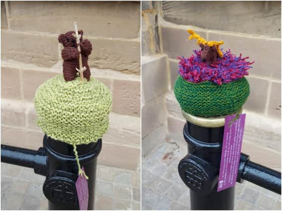 Some of the knitted bollard covers for the bollards around the museum. Photo supplied