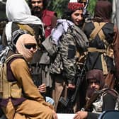 Taliban fighters patrol in a vehicle along a street in Kabul on September 2, 2021. (Photo by Aamir QURESHI / AFP) (Photo by AAMIR QURESHI/AFP via Getty Images)