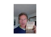 Steve Attridge with his novel Sometimes I Disappear.