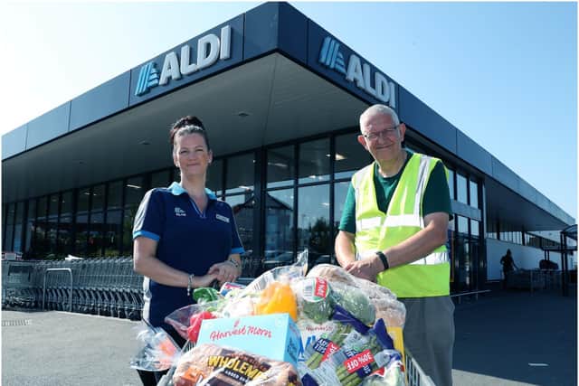 Lisa Richards from Aldi and Simon Peaple from Tamworth Heart charity. Photo supplied