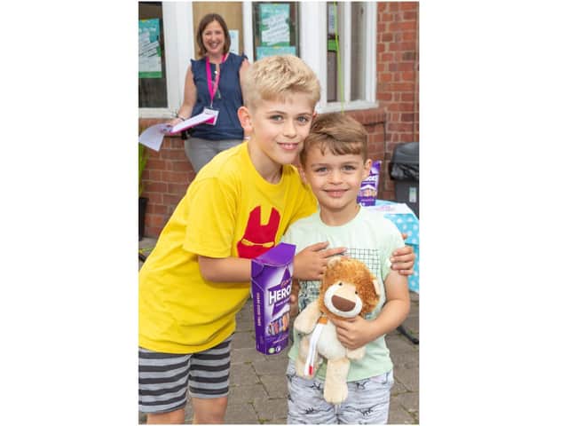 Brothers Connor 9 & Ewan 5 with an Olly The Brave. Photo by Victoria Jane Photography