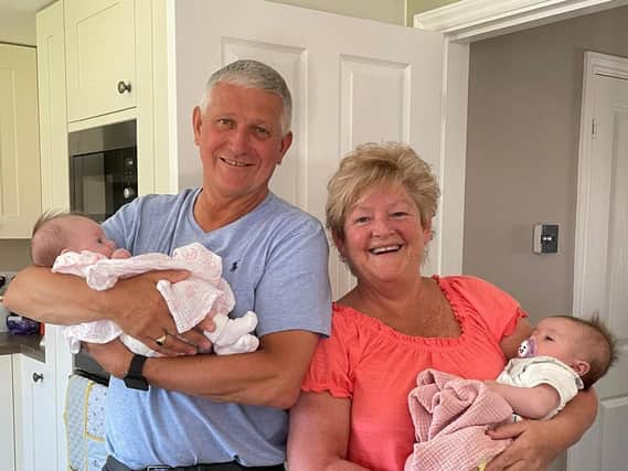 Proud grandparents Brian and Jan with the baby girls Harper and Izzie.