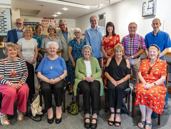 Life members of the Leamington and Warwick Musical Society together with long service members, committee and production teams from across the years attended the unveiling of a century painting and commemorative plaque at the Spa Centre. Photo by Helen Ashbourne.