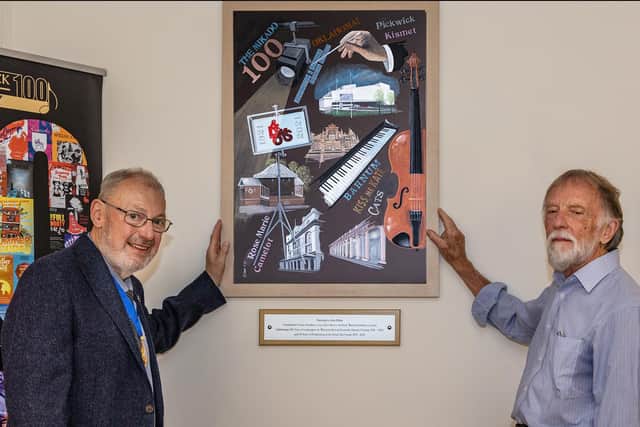 Councillor Martyn Ashford of Warwick District Council and artist John Ellam unveil John's centenary painting to mark 100 years of the Leamington and Warwick Musical Society. Photo by Helen Ashbourne.