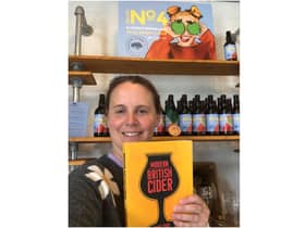 Charlotte Olivier with the book. Photo supplied