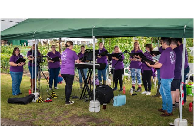Stratford-based choir Amicantus performed at the allotments in August as part of the National Garden Scheme Open Days. Photo supplied
