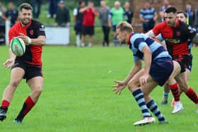 Ed Spencer with the ball for Newbold   (PICTURES BY STEVE SMITH)