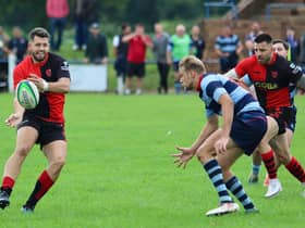Ed Spencer with the ball for Newbold   (PICTURES BY STEVE SMITH)