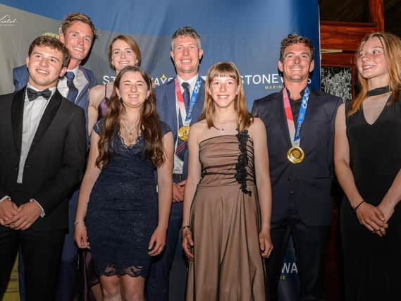 Awards dinner: Millie and Jess (L-R centre front) with fellow youth award nominees and GBR Tokyo Olympic sailors (L-R) Chris Grube and gold medallists Eilidh McIntyre, Stu Bithell and Dylan Fletcher at the 2021 YJA Awards (Picture Sam Kurtul, World of the Lens)