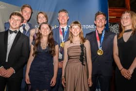 Awards dinner: Millie and Jess (L-R centre front) with fellow youth award nominees and GBR Tokyo Olympic sailors (L-R) Chris Grube and gold medallists Eilidh McIntyre, Stu Bithell and Dylan Fletcher at the 2021 YJA Awards (Picture Sam Kurtul, World of the Lens)