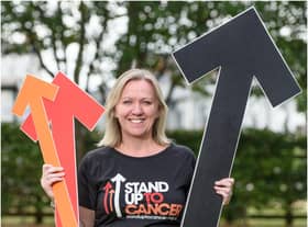 Warwick mum and breast cancer survivor Louise Roberts will be standing up for 13 hours on October 13 to raise money for Stand Up To Cancer’s life-saving research – four years to the day since she rang the bell for the end of treatment. Photo supplied