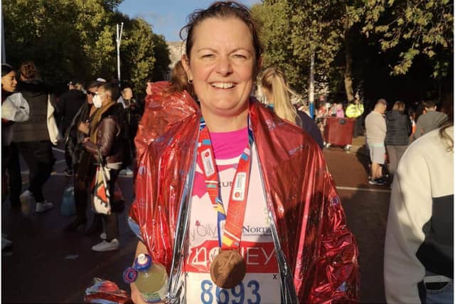 Claire Hammond from Warwick after completing the London Marathon . Photo supplied