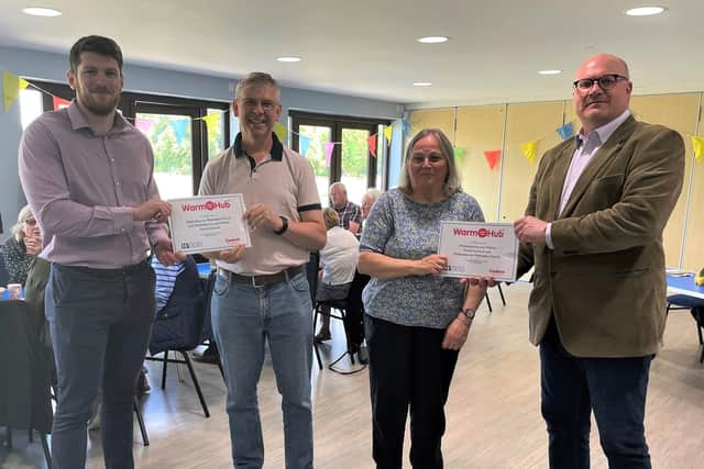 Graeme Russell, Wellesbourne Methodist Church and Community Missioner (second left) and Cllr Anne Prior, Wellesbourne and Walton Parish Council Chair, receiving their Warm Hub certificates from Edward Allard, Cadent Social Programmes Manager (far left) and Kim Slater, WRCC CEO (far right). Photo supplied