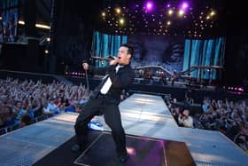 Robbie Williams takes to the stage at BST Hyde Park this weekend (July 6), but will the weather hold out for the “Angels” singer? (Credit: Getty Images)