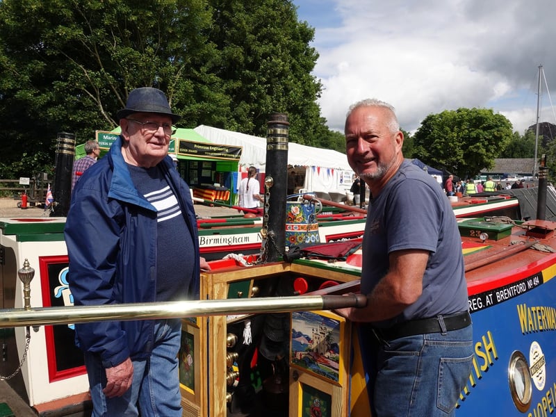 The former working boatman Jim Hambridge, 80, pictured with current owner of the Cassiopeia narrowboat, Mick Poyser, at the 2022 Rally.