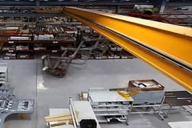 A still image from the CCTV footage showing the moment a worker fell from a scissor lift and fractured his skull, leaving him in an induced coma.