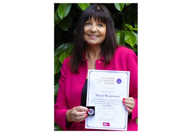Tracey McAtamney with her Platinum Champion Award from The Royal Voluntary Service. Photo by Dy Holmes