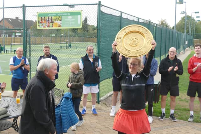 Janette George, chair and captain of the Leamington Tennis and Squash Club, holds aloft the Bowen Bowl after winning the first match for the trophy against local rivals, Warwick Boat Club held on Sunday October 9.