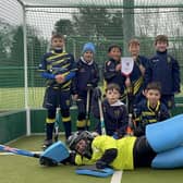 Rugby & East Warwickshire's Under-10s hockey players celebrate their county championship success